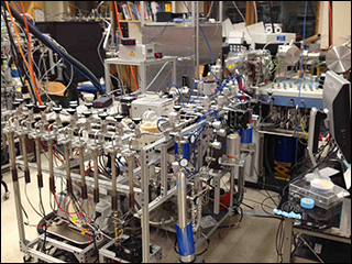 Isotopomer ratios measuring instrument on a big cart. Isotopomer ratios measuring instrument on a big cart.