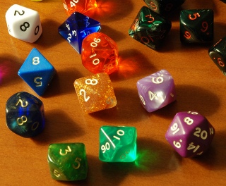 Dice of different shapes and colors. Dice of different shapes and colors.