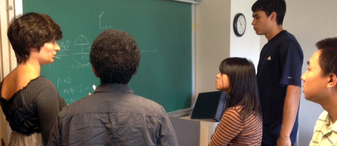 hoto of students in a classroom. hoto of students in a classroom.