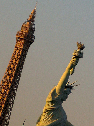 Image showing the Eiffel Tower next to the Statue of Liberty. Image showing the Eiffel Tower next to the Statue of Liberty.