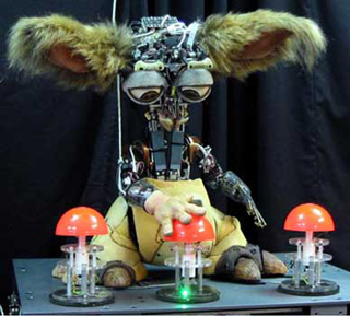 Photo of Leo, a robot with big, furry ears. Photo of Leo, a robot with big, furry ears.