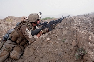 A U.S. Marine in Afghanistan looking for insurgents. A U.S. Marine in Afghanistan looking for insurgents.