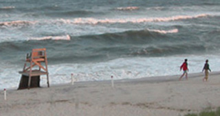 A photograph of the coast of Fire Island, New York. A photograph of the coast of Fire Island, New York.