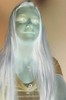A negative-processed photo of a girl.