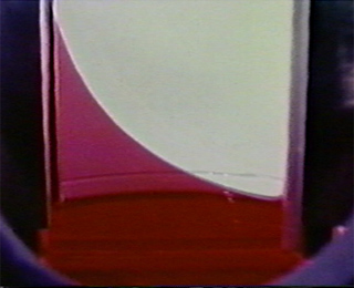 Corn oil rising between the plates. The surface shows a curve with the end with the smallest separation distance rising highest. Corn oil rising between the plates. The surface shows a curve with the end with the smallest separation distance rising highest.