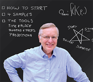 Professor Winston in front of a chalkboard with writing on it. Professor Winston in front of a chalkboard with writing on it.